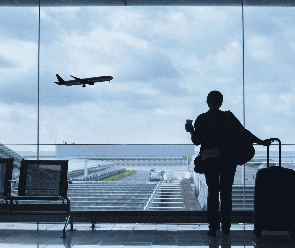 stock image of a traveler in an airport